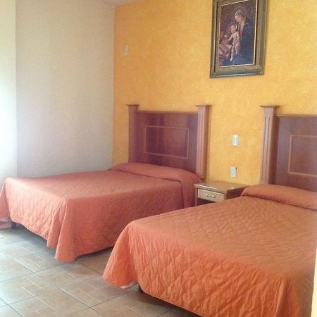 Hotel Genoves ซานฮวน เด ลอสลากอส ห้อง รูปภาพ